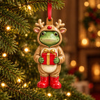 Reindeer Gift frog ceramic ornament: frog in a reindeer costume holding a red present with a gold bow, hanging on a Christmas tree