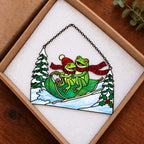 Frog Couple Sledding on a Leaf Holographic Acrylic Suncatcher