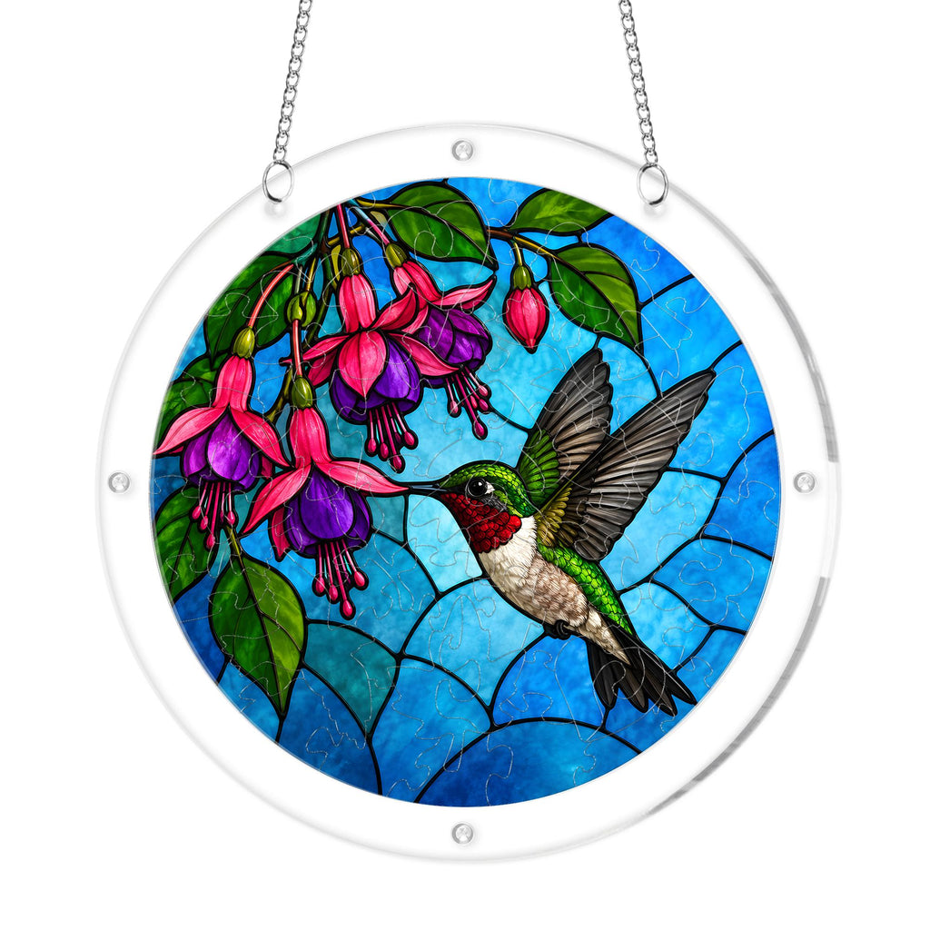 Round hummingbird fuchsia flower acrylic puzzle suncatcher on white background with clear acrylic frame and hanging chain
