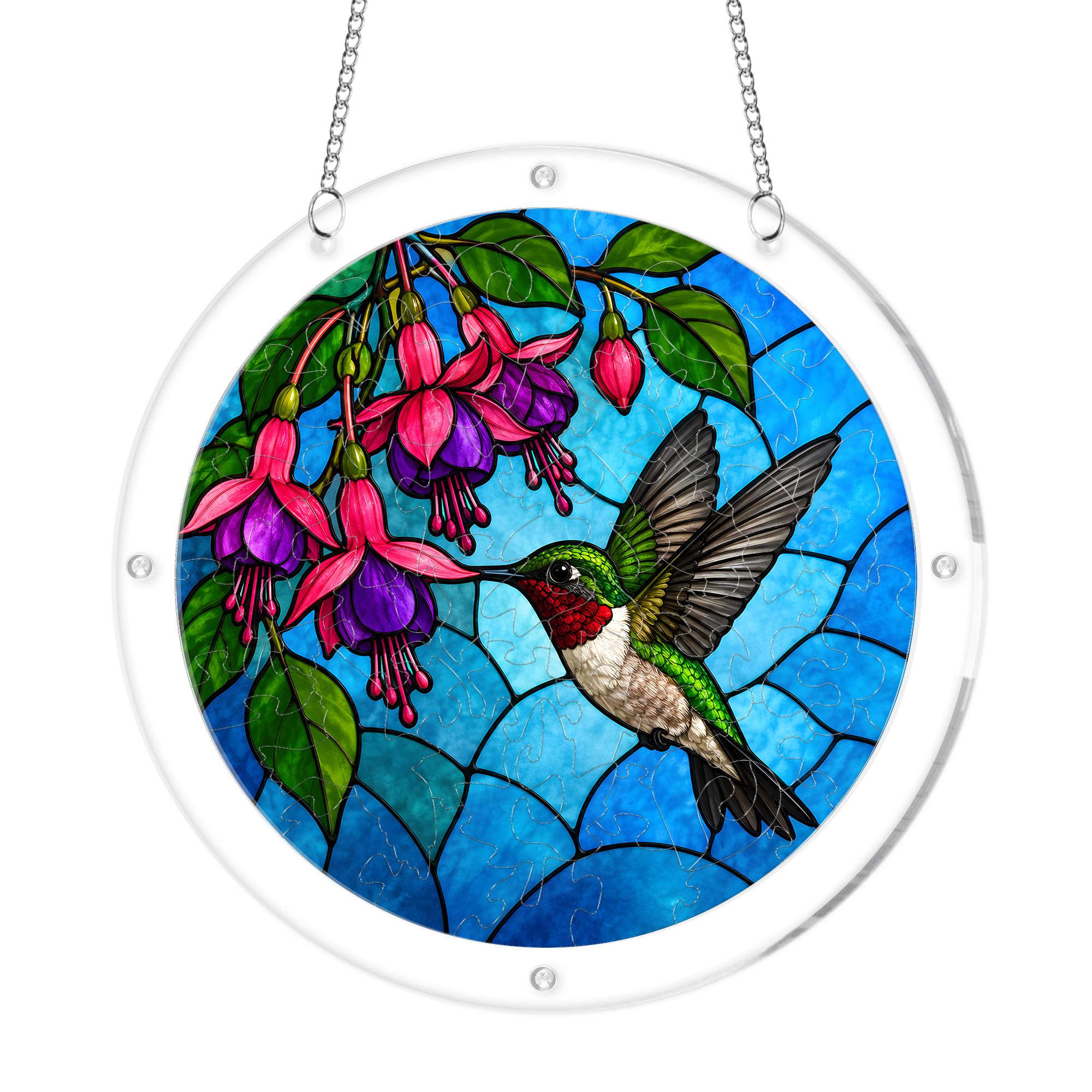 Round hummingbird fuchsia flower acrylic puzzle suncatcher on white background with clear acrylic frame and hanging chain