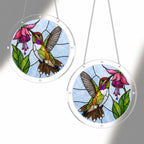 Two hummingbird pink fuchsia flower acrylic puzzle suncatchers hanging together to show different display sizes