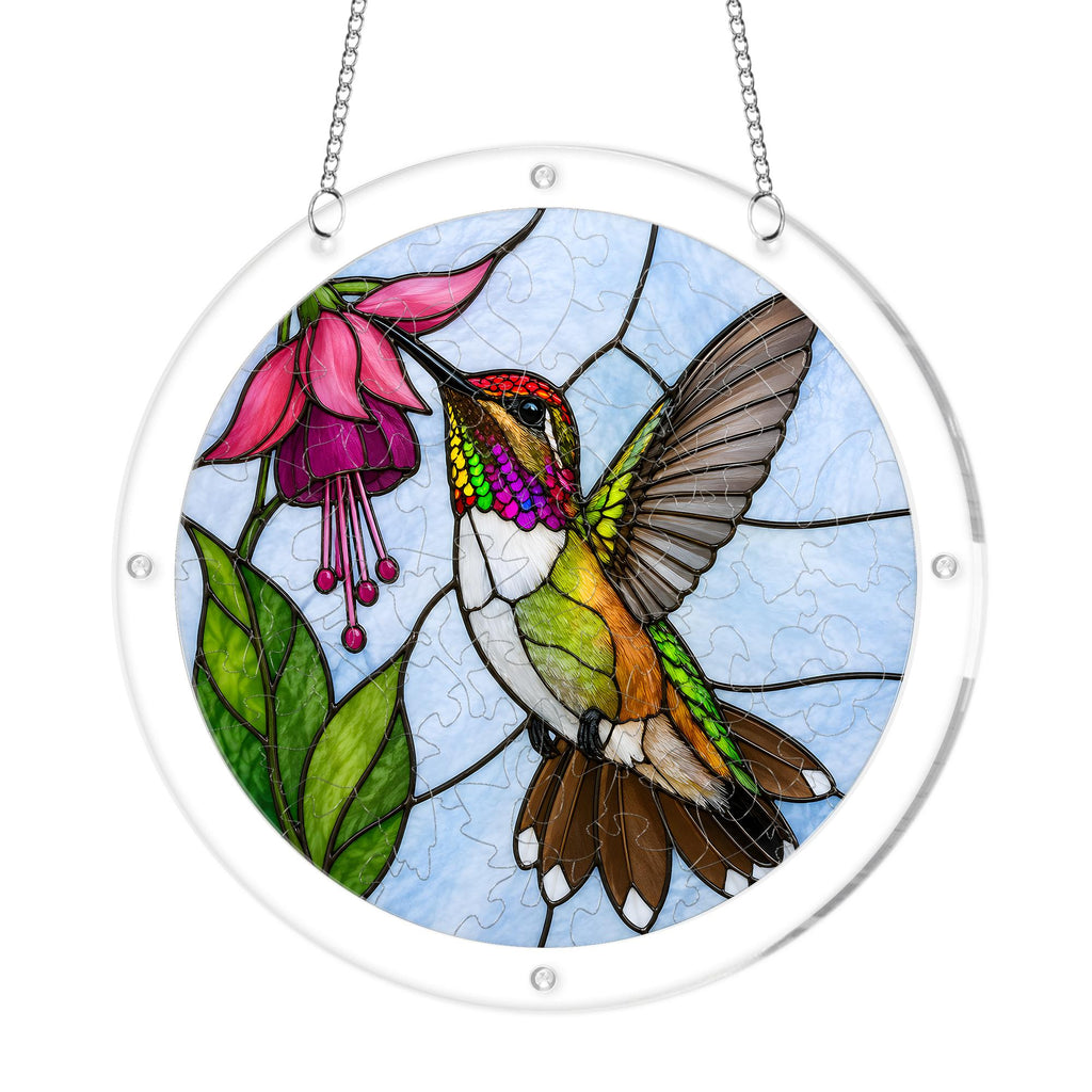 Round hummingbird pink fuchsia flower acrylic puzzle suncatcher on white background with clear acrylic frame and hanging chain