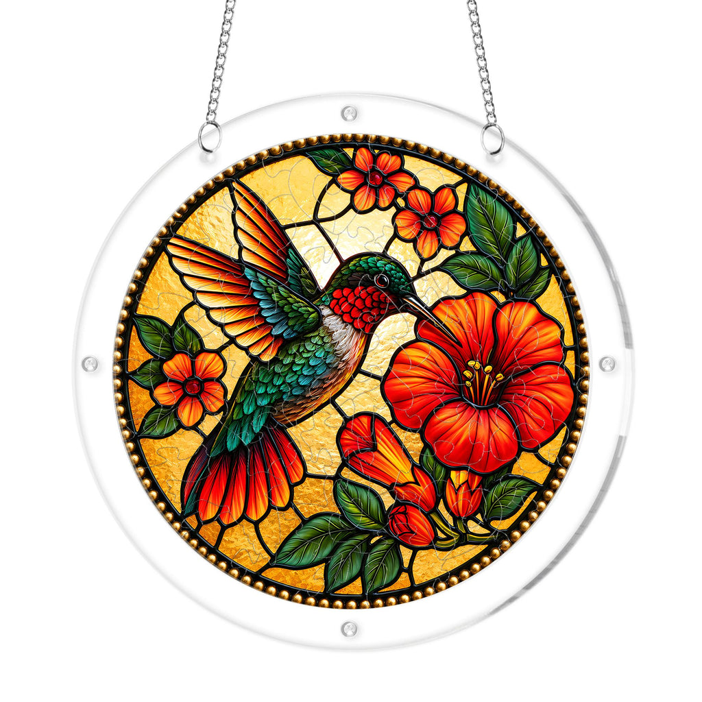 Round hummingbird red hibiscus acrylic puzzle suncatcher on white background with clear frame and hanging chain