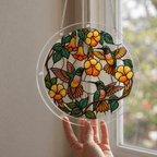 Hummingbird yellow flower acrylic puzzle suncatcher hanging by a window
