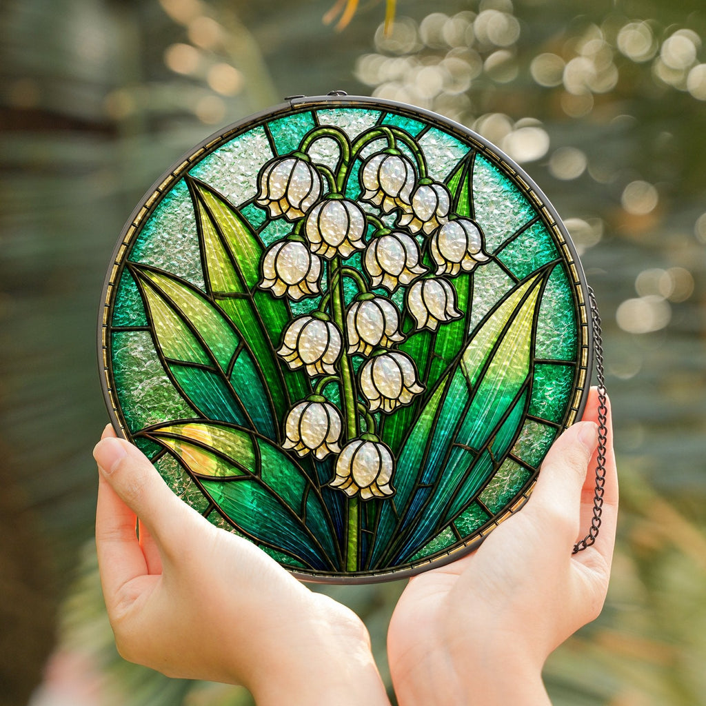 Lily of the valley stained glass suncatcher held in hand