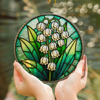 Lily of the valley stained glass suncatcher held in hand