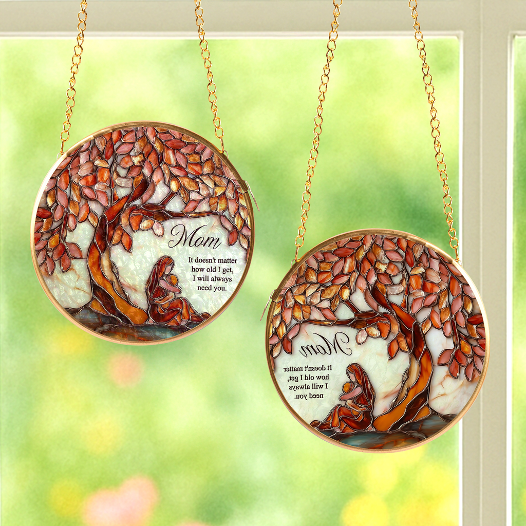 Close-up detail of Mom Tree of Life stained glass artwork with warm amber leaves