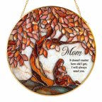 Flatlay view of Mom Tree of Life stained glass suncatcher with gift box and decor accessories