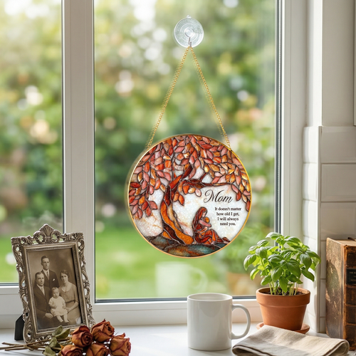 Mom Tree of Life stained glass suncatcher hanging on a sunlit window with cozy home decor