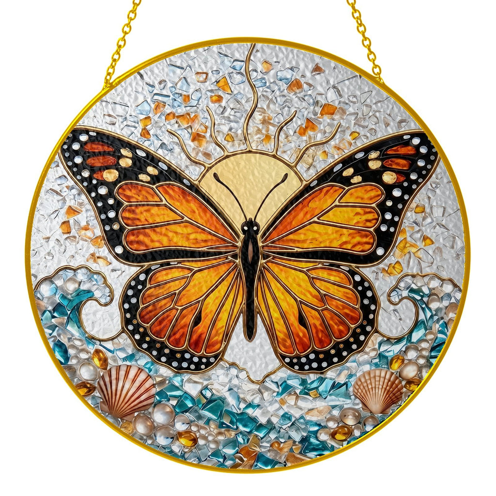 Monarch butterfly stained glass suncatcher held in hand