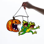 Monster Pumpkin Chasing Frogs Holographic Acrylic Suncatcher