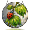 Ladybug on dewy green leaves stained glass suncatcher
