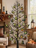 24 Frog Hollow Halloween frog ornaments hung on a small black Halloween tree