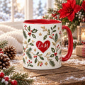 Personalized couple initials Christmas mug with red heart and holly on a snowy wood table with poinsettia