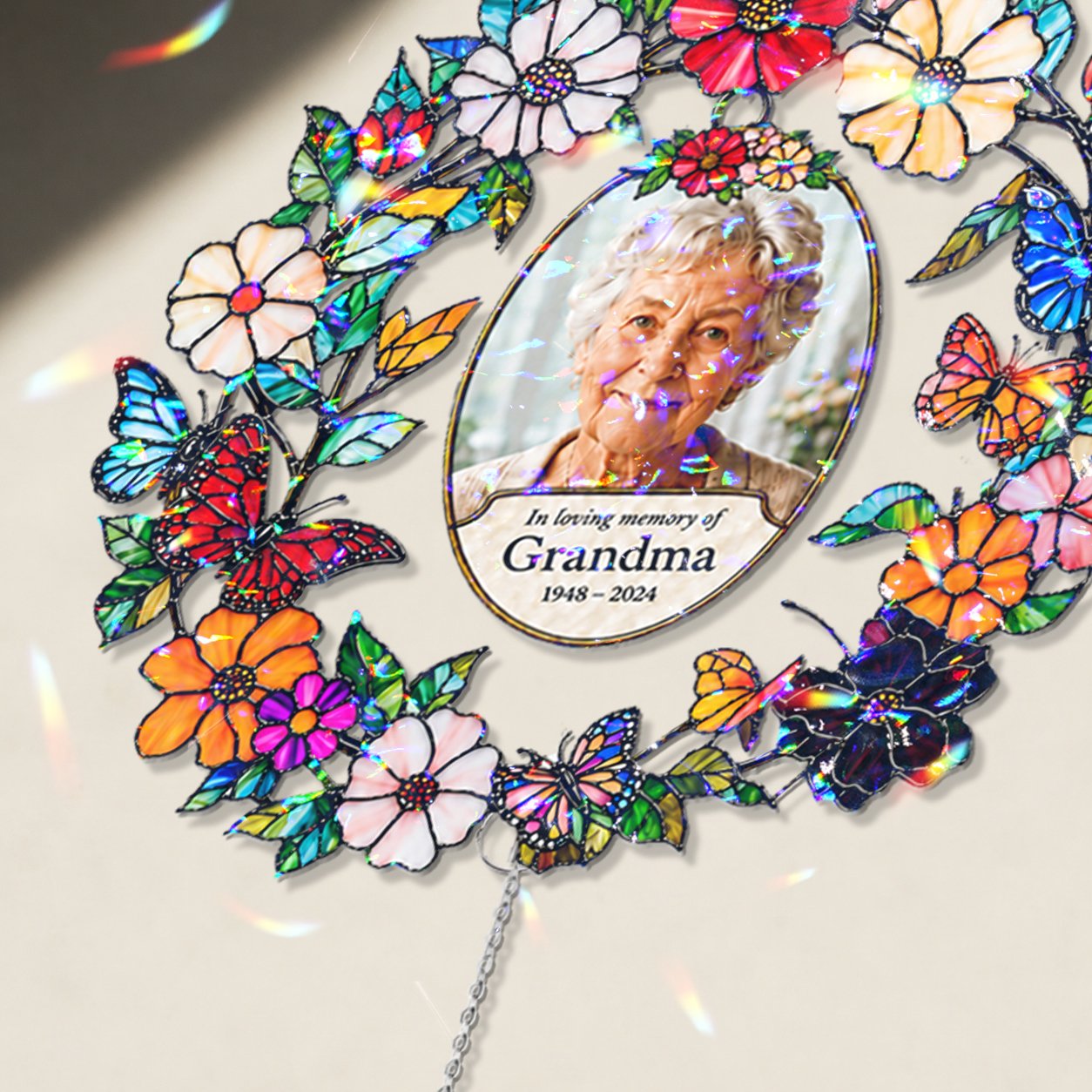 Personalized floral photo memorial wreath crystal suncatcher in a window