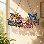 Butterfly and roses name suncatcher casting butterfly shadows and rainbow sparkles on the wall