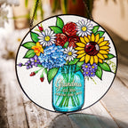 Personalized grandma suncatcher hanging in a sunny window