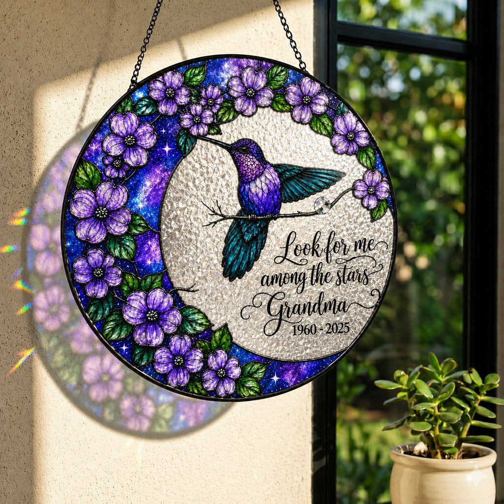 Hummingbird moon memorial suncatcher in a window