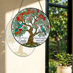 Memorial suncatcher near a window with colorful light reflection on the wall