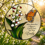 Personalized lily of the valley butterfly memorial suncatcher in a window