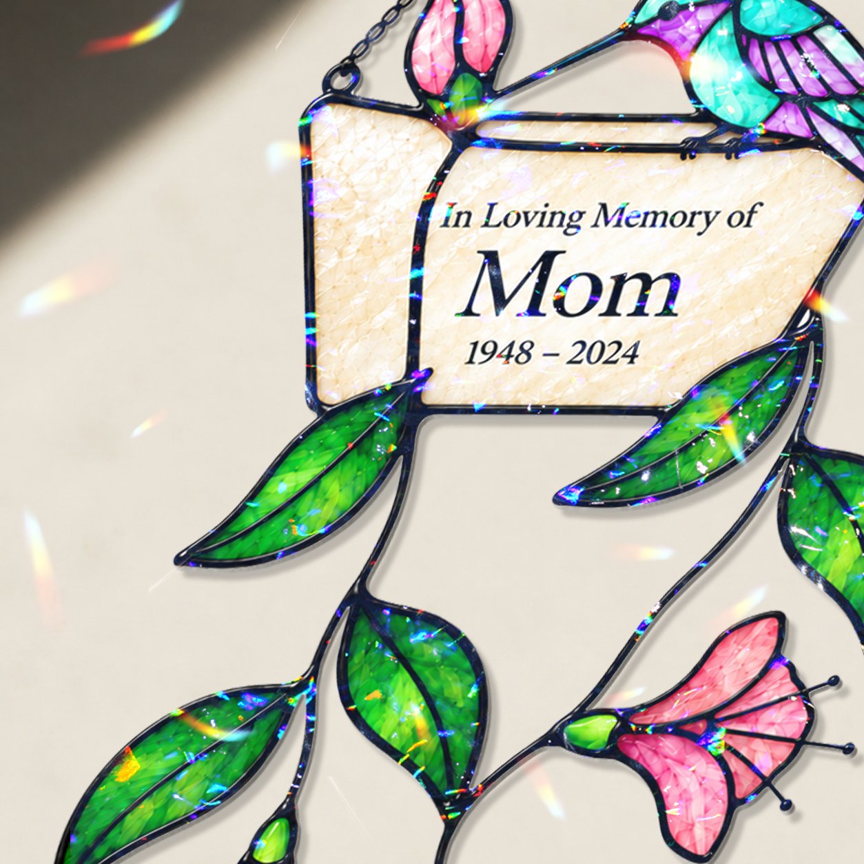 Personalized mom memorial hummingbird holographic suncatcher in a window