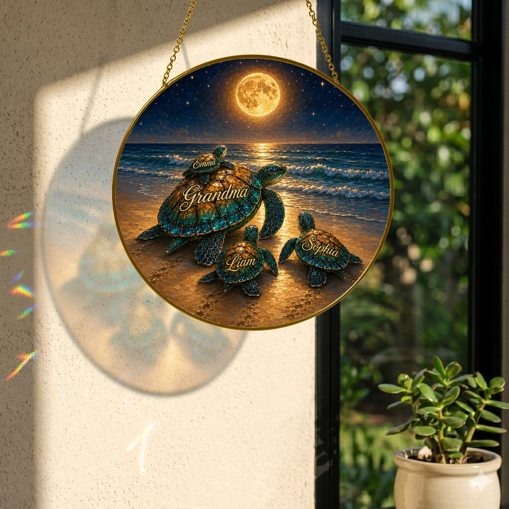 Personalized sea turtle family suncatcher hanging by a window