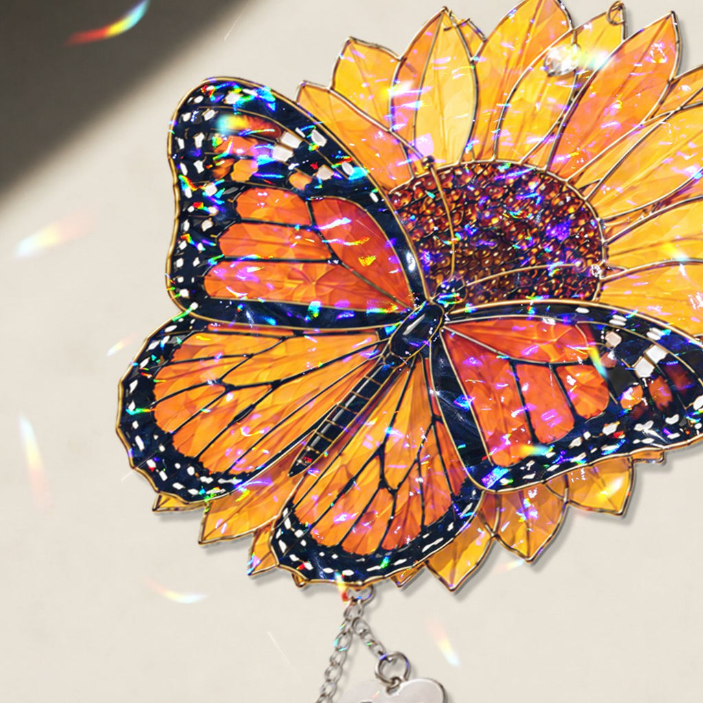 Personalized sunflower butterfly memorial crystal suncatcher in a window