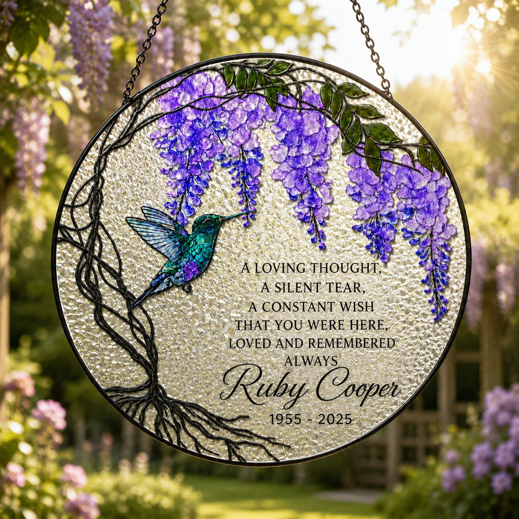 Personalized wisteria memorial suncatcher in a window