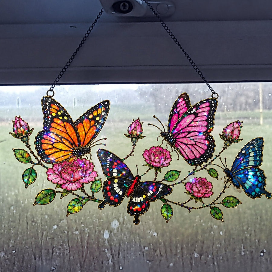 Butterfly Garden & Roses suncatcher on a rainy window