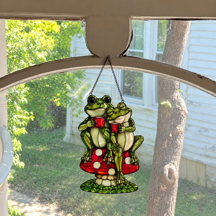 Frog Couple on Mushroom suncatcher in an arched porch window