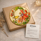 Red clematis bird stained glass suncatcher on Pixiwoo gift packaging