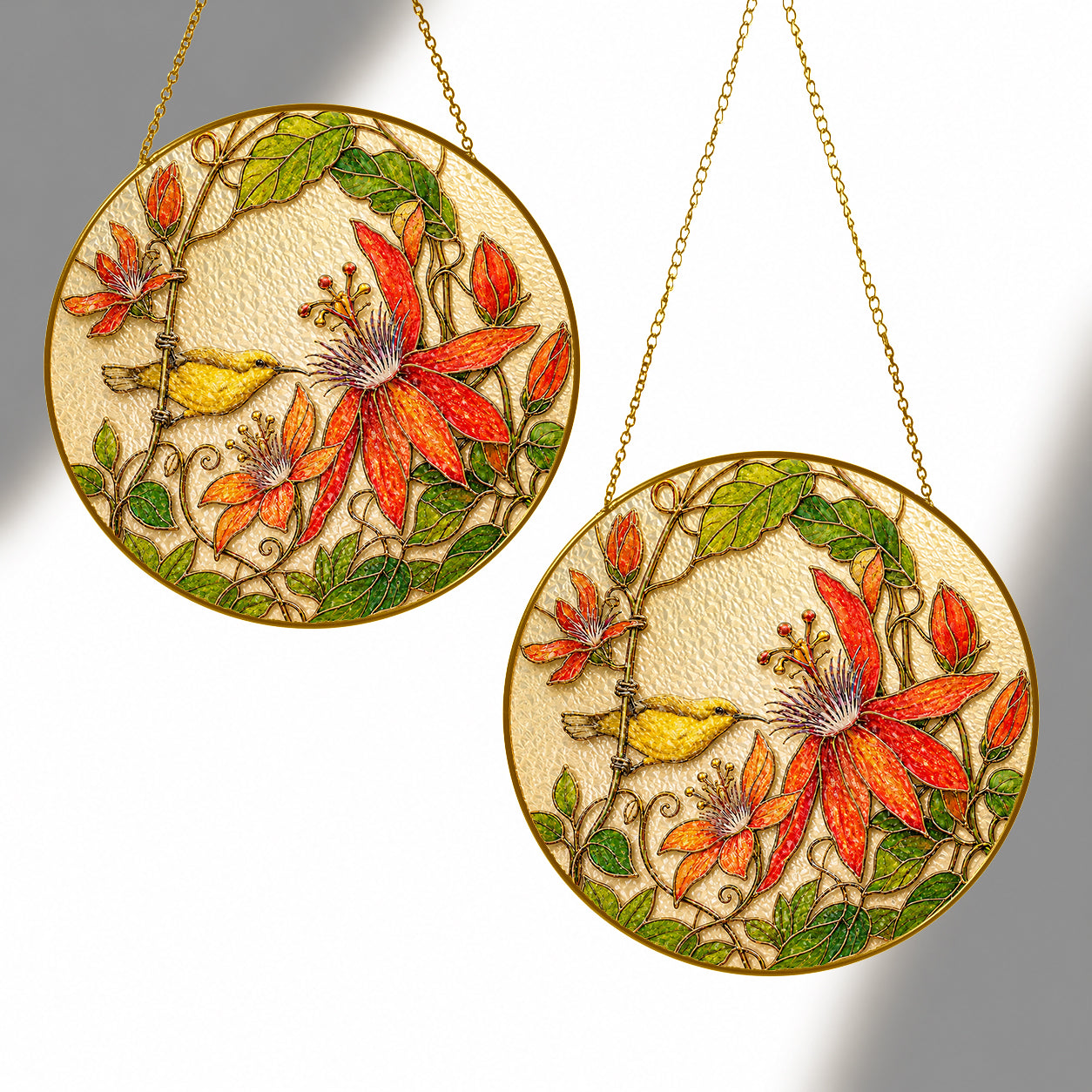 Red clematis bird suncatcher shown in two sizes