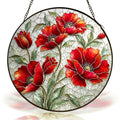 Red poppy stained glass suncatcher with black frame on a white background