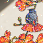 Robin and orange trumpet flower holographic suncatcher in a bright home lifestyle setting