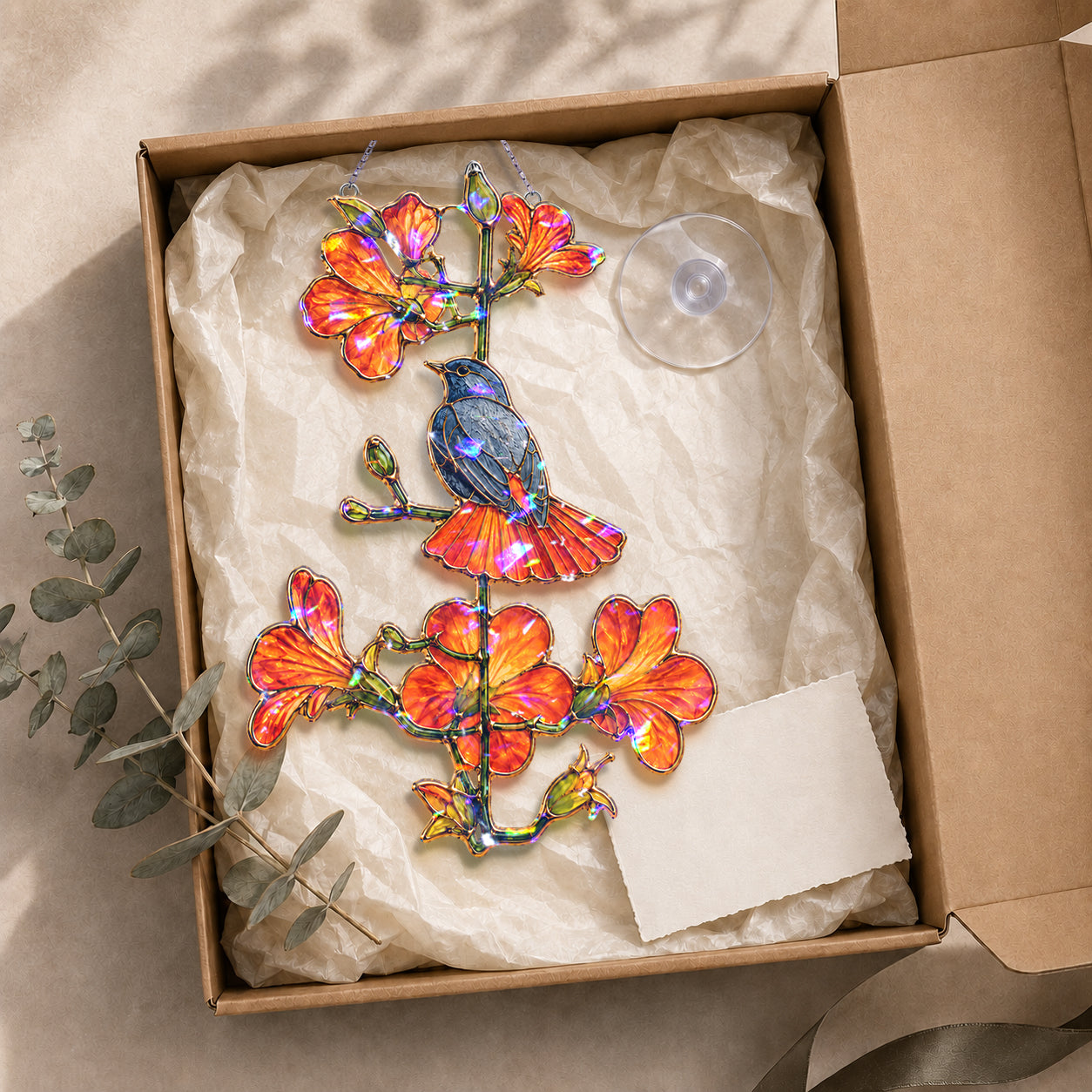 Close-up detail of the robin and orange trumpet flower holographic acrylic suncatcher's wavy acrylic and hologram texture