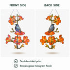 Double-sided robin and orange trumpet flower holographic acrylic suncatcher glowing in natural light