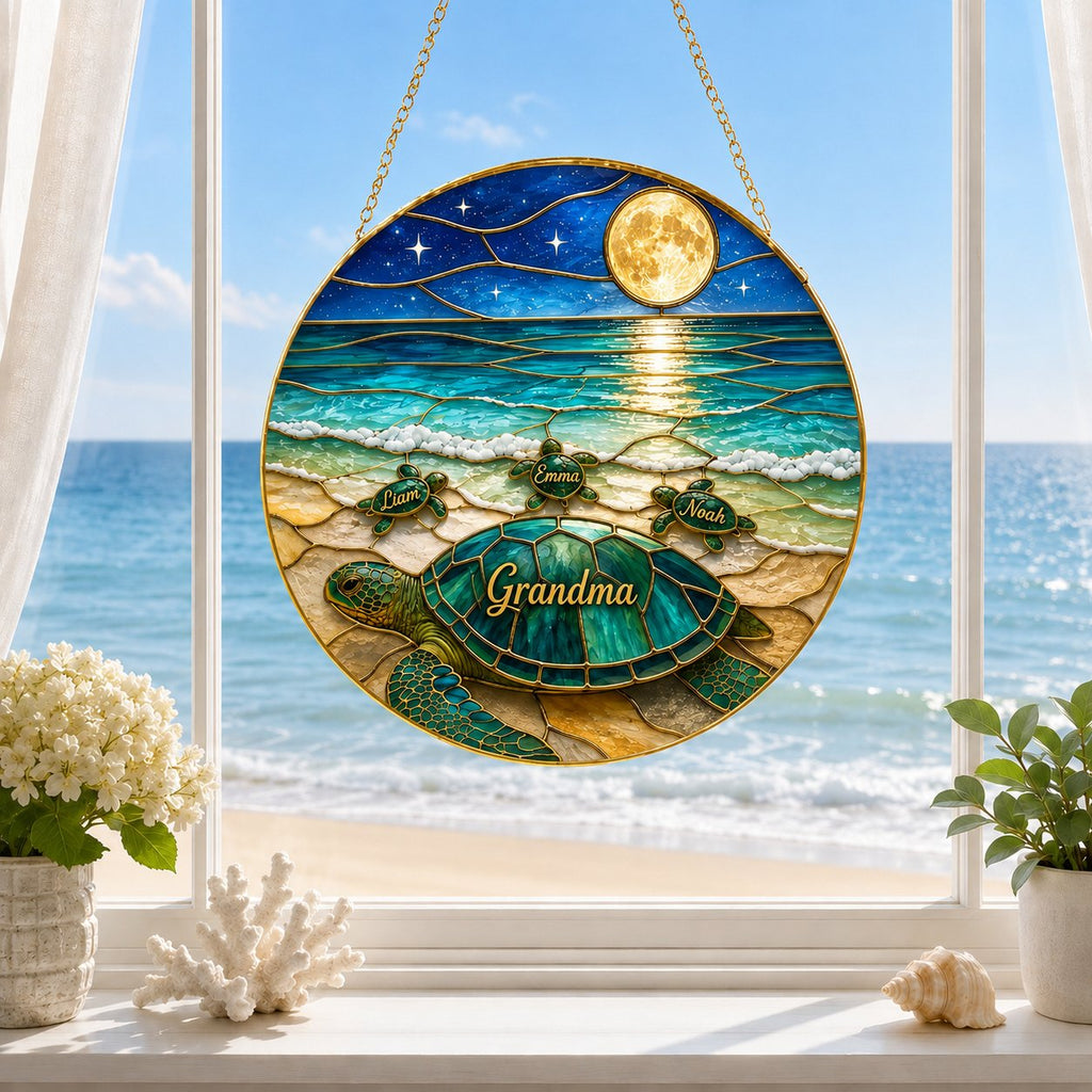 Sea turtle family full moon stained glass suncatcher in a window
