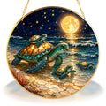 Sea turtle mom and babies stained glass suncatcher with gold frame