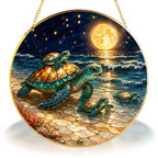 Sea turtle mom and babies stained glass suncatcher with gold frame