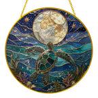 Sea turtle moon stained glass suncatcher held in hand