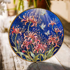 Spider lily and butterfly stained glass suncatcher with gold frame on a white background