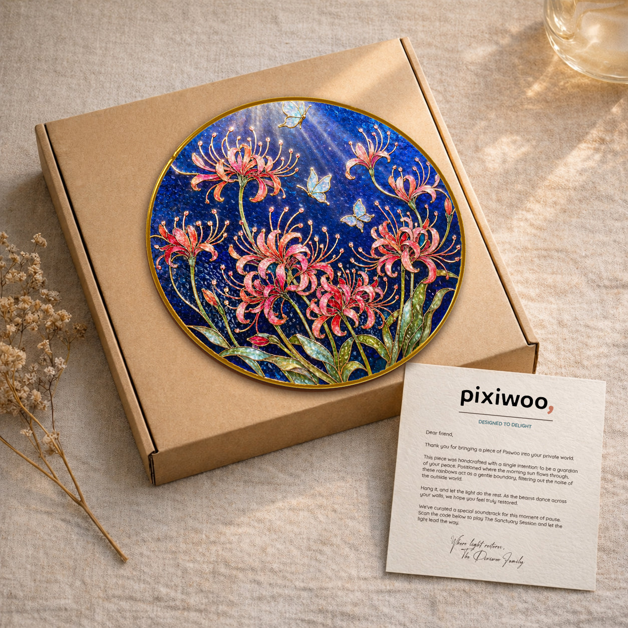 Spider lily butterfly suncatcher on Pixiwoo gift packaging