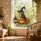 Witch Hat Owl on Pumpkin holographic acrylic suncatcher in natural daylight