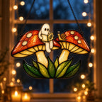 Two Ghosts on Red Mushrooms holographic acrylic suncatcher hanging in a sunlit window
