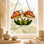 Close-up of the Two Ghosts on Red Mushrooms holographic suncatcher showing its stained-glass style artwork