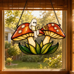 Two Ghosts on Red Mushrooms holographic suncatcher with sunlight passing through the acrylic