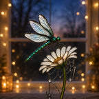 Dragonfly on Daisy suncatcher displayed in a home window