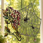 Autumn Spider Web with Flowers window suncatcher seen against a sunlit garden