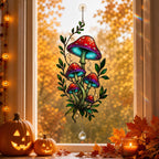 Red Mushroom Cluster with Vines suncatcher on its metal hanging chain in a bright window