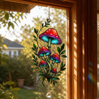 Red Mushroom Cluster with Vines acrylic suncatcher in a warm, softly lit interior